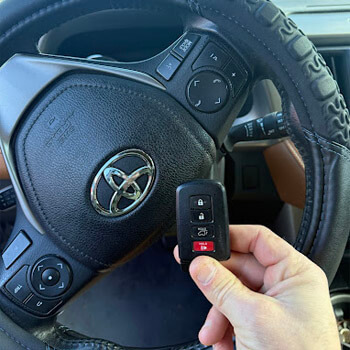Toyota key fob programming inside vehicle by Defense Locksmith Buffalo NY