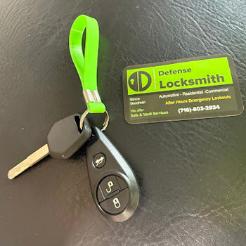 Defense Locksmith branded service tag attached to customer key Buffalo NY