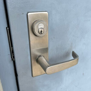 Chrome commercial deadbolt and lever installation by Defense Locksmith Buffalo NY