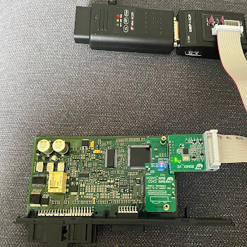 Car ECU circuit board for computer programming by Defense Locksmith Buffalo NY