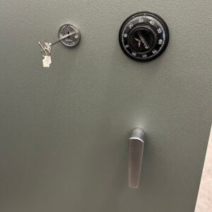 Combination dial lock service on a safe by Defense Locksmith Buffalo NY