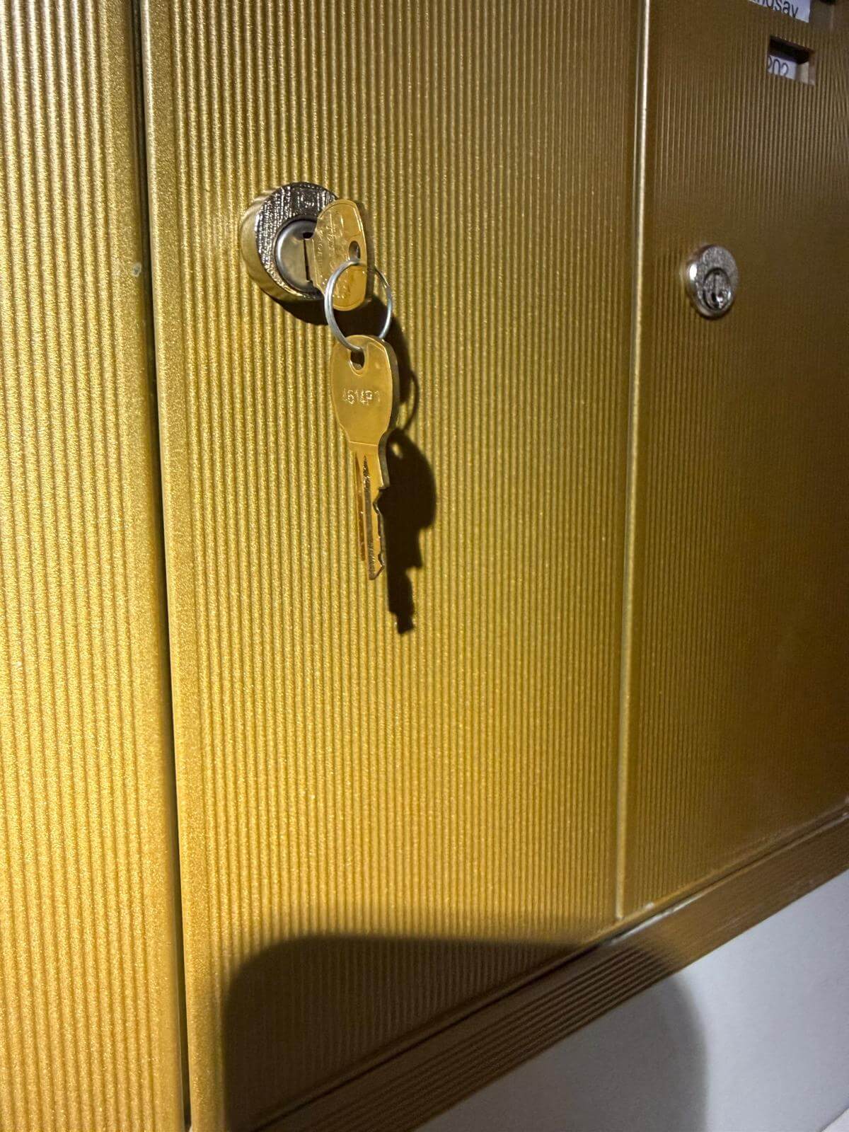 Cabinet lock rekey service in Buffalo, NY Cabinet cam lock with keys after a rekey by a Buffalo, NY locksmith