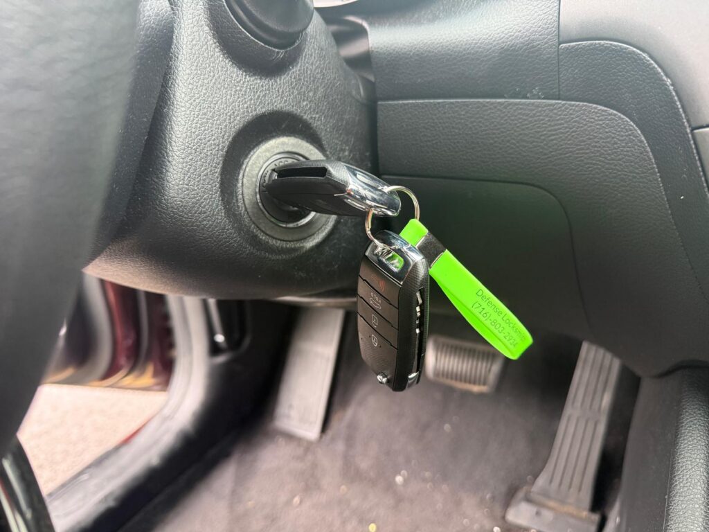 Car key fob in the ignition during automotive locksmith service in the Buffalo Metro area