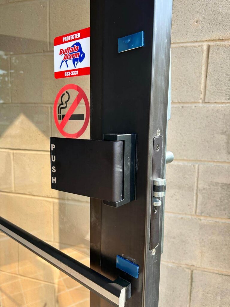 Commercial access control door with push bar lock hardware in the Buffalo Metro area