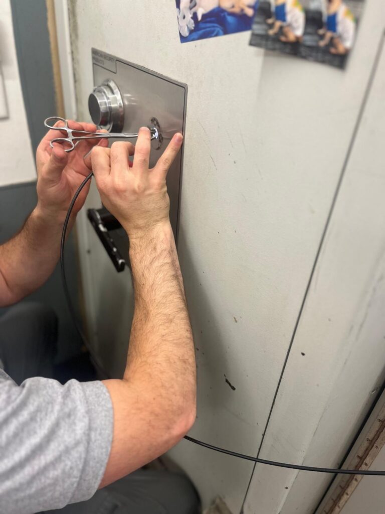 Locksmith opening a large commercial cash safe in Buffalo, NY