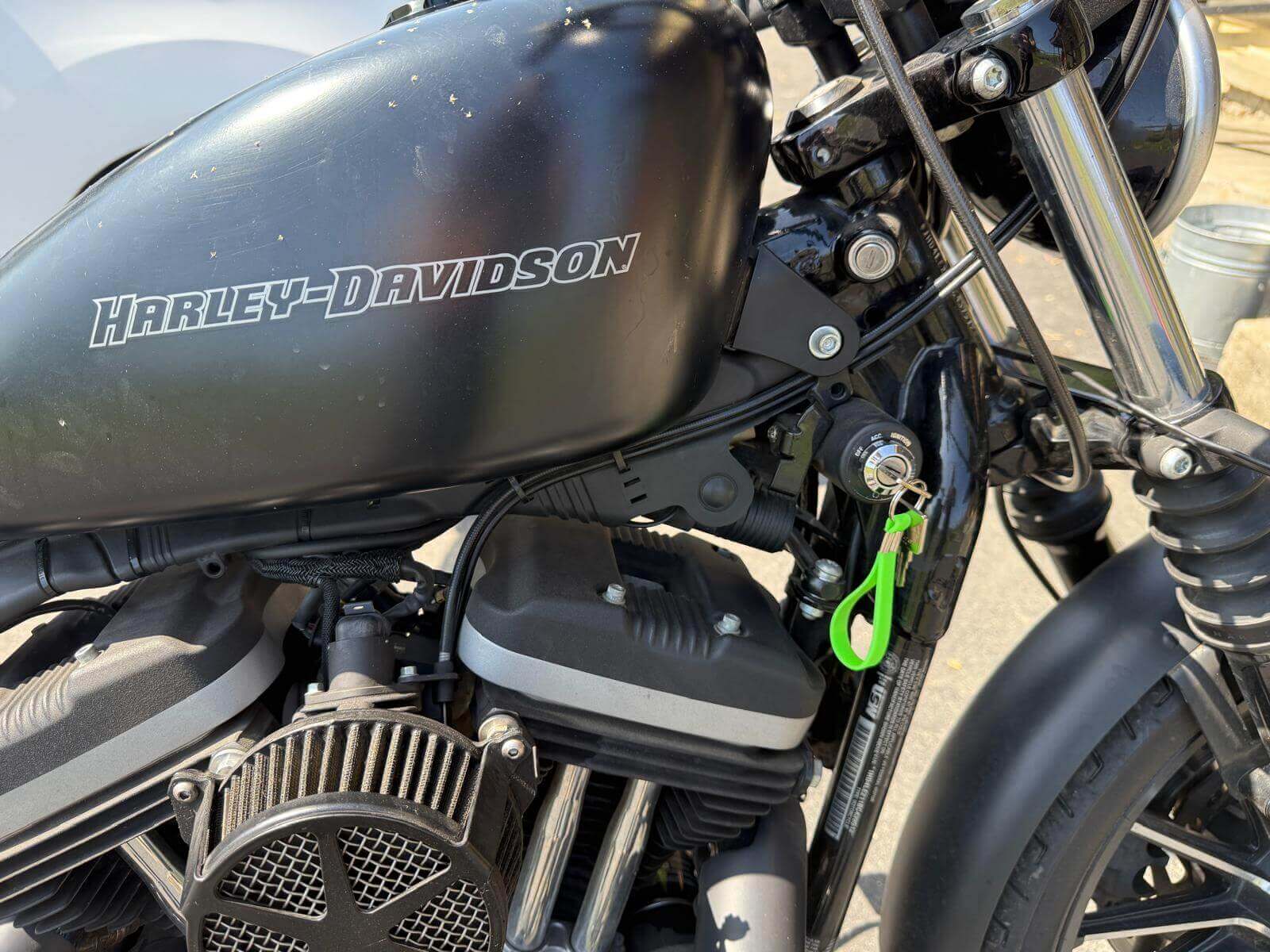Harley-Davidson motorcycle key service in Buffalo, NY Harley-Davidson motorcycle with a Defense Locksmith key tag after on-site key replacement in Buffalo, NY