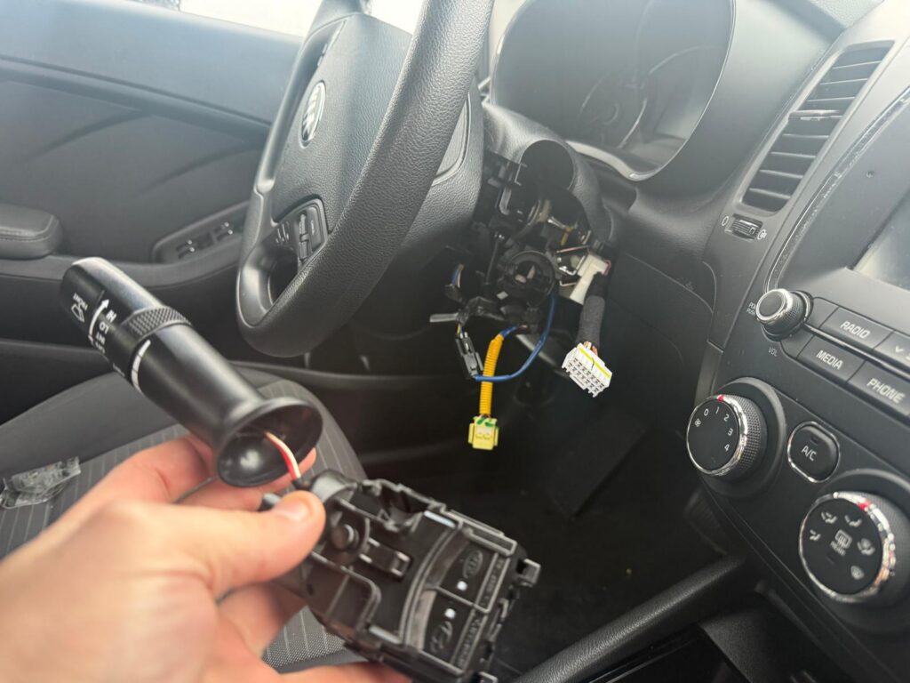 Kia ignition key turning during automotive locksmith service in the Buffalo Metro area