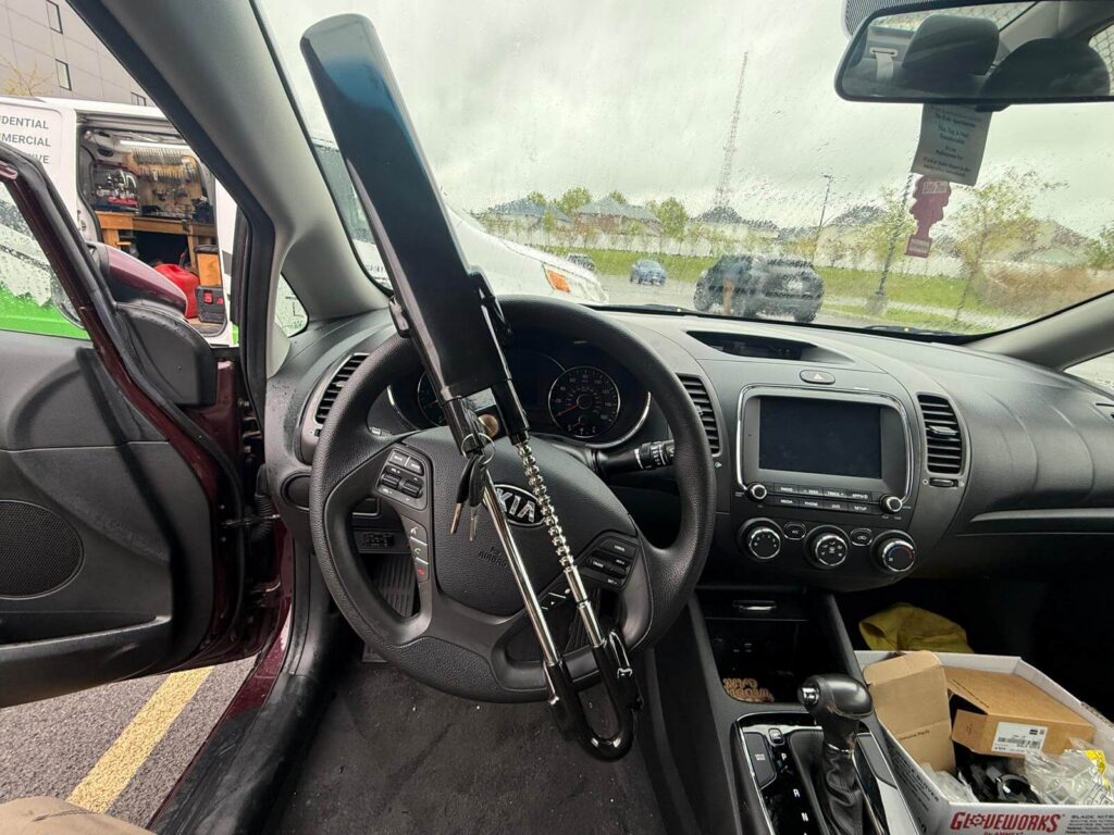 Kia interior locksmith service with key cutting tools inside the vehicle in the Buffalo Metro area